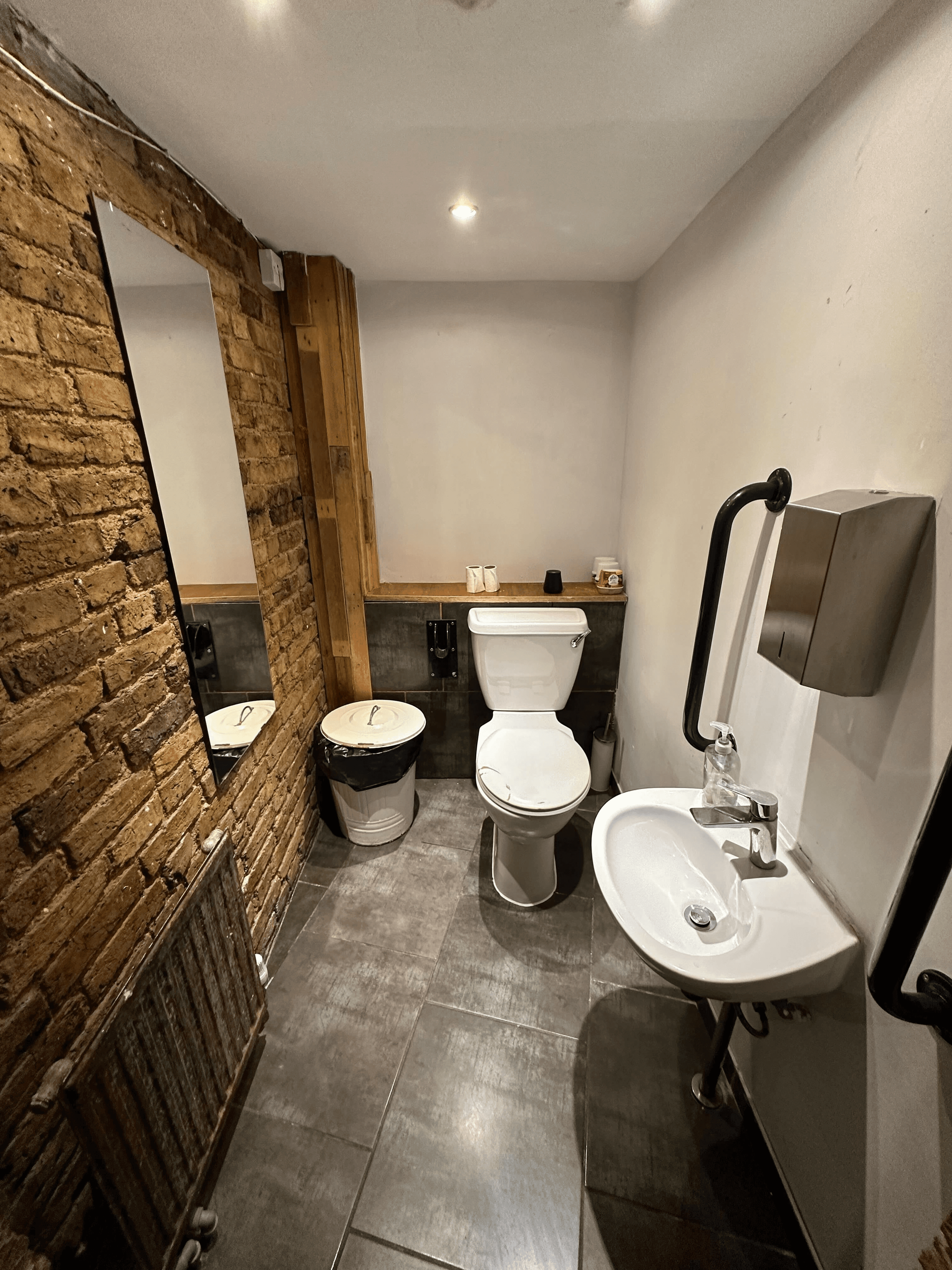 View of a small, cramped bathroom