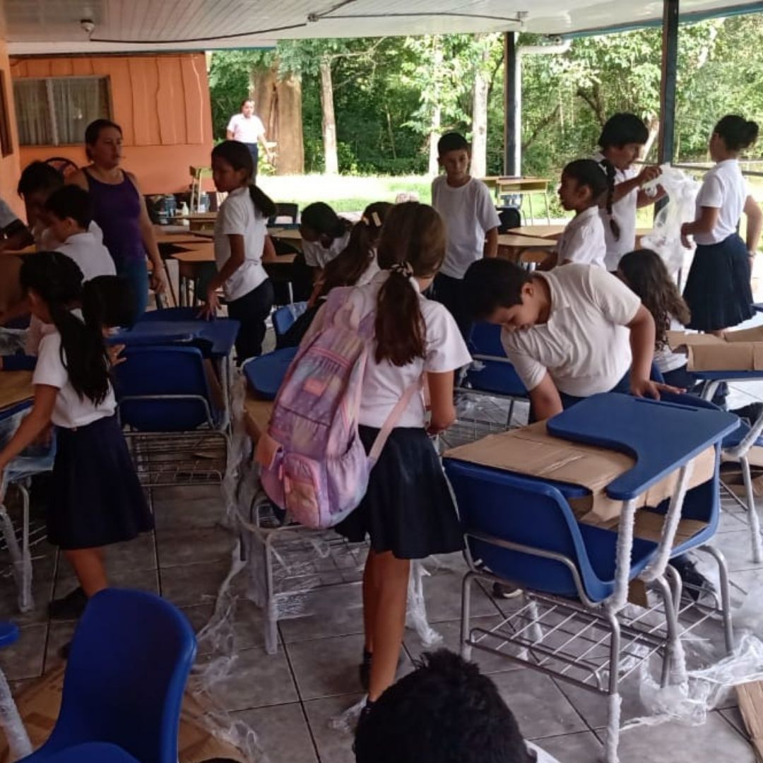 a black and white living room with a large tv
