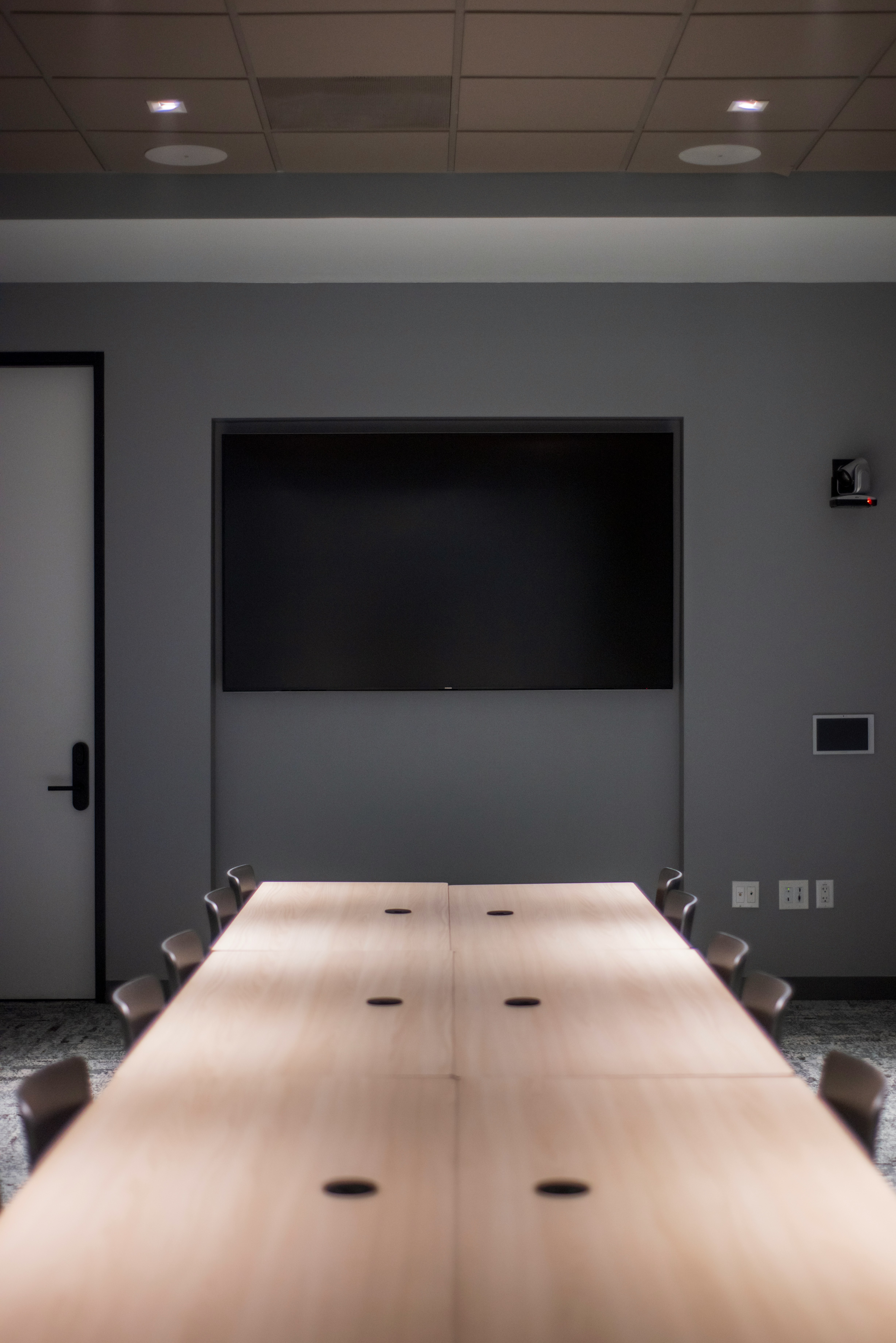 black flat screen tv on white wall