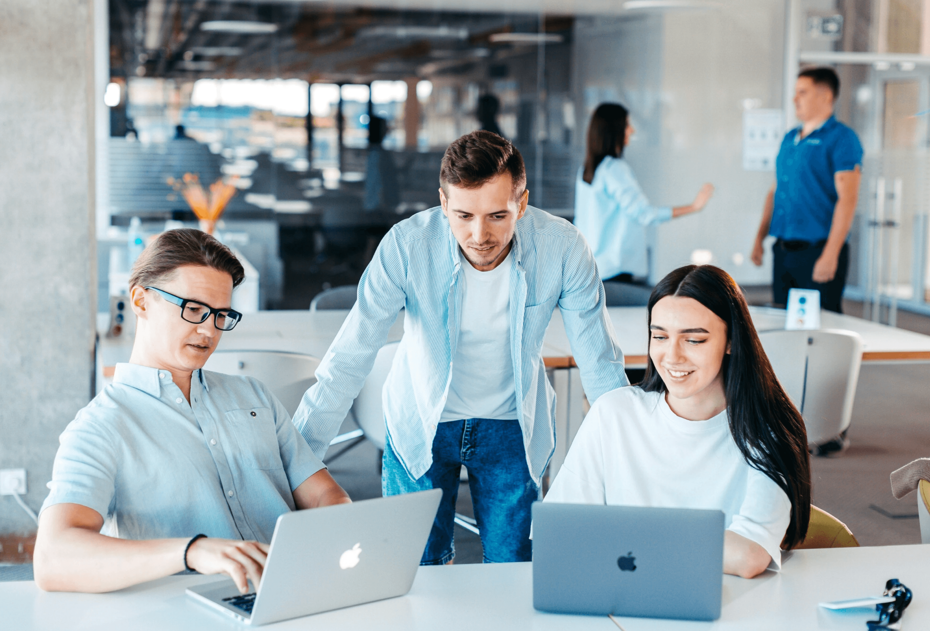 Group of people using laptop