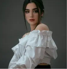 woman in white off shoulder dress