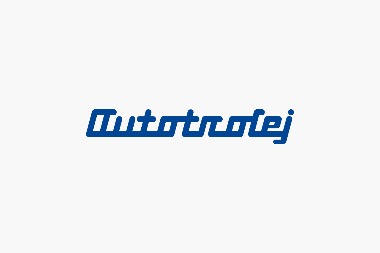 Autotrolej wordmark logo. Dark blue with joined lettering in a retro style