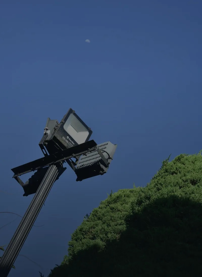 LED floodlights on a steel pole bracket