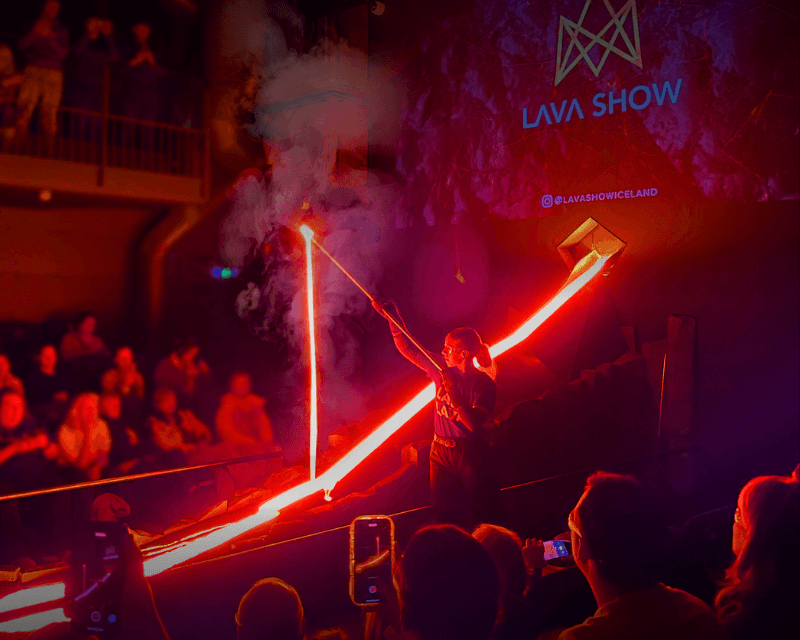 Molten lava being poured during Lava Show in Reykjavík, Iceland, with glowing lava flow, smoke, and audience watching—one of the most unique things to do in Reykjavik.