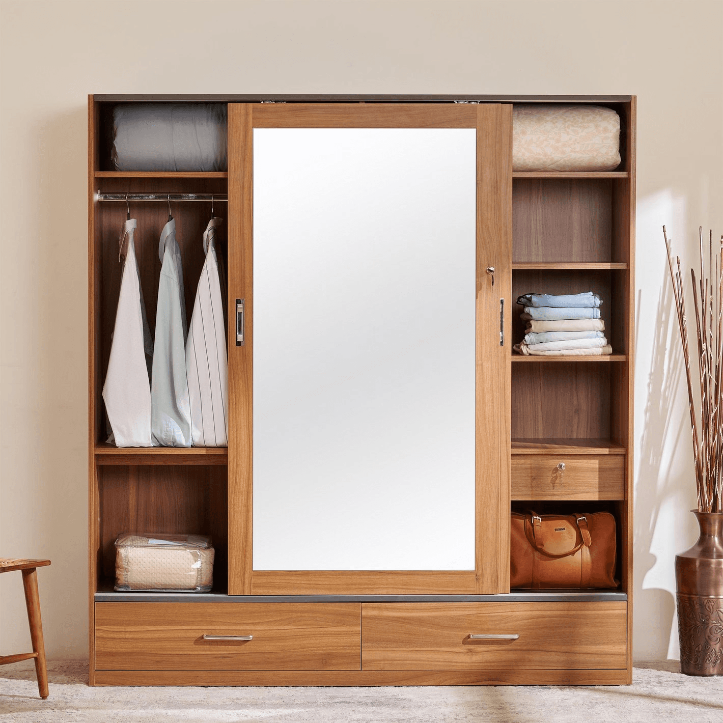 A modern walk-in closet featuring wooden shelving, glass doors, a mirror, and a cushioned ottoman.