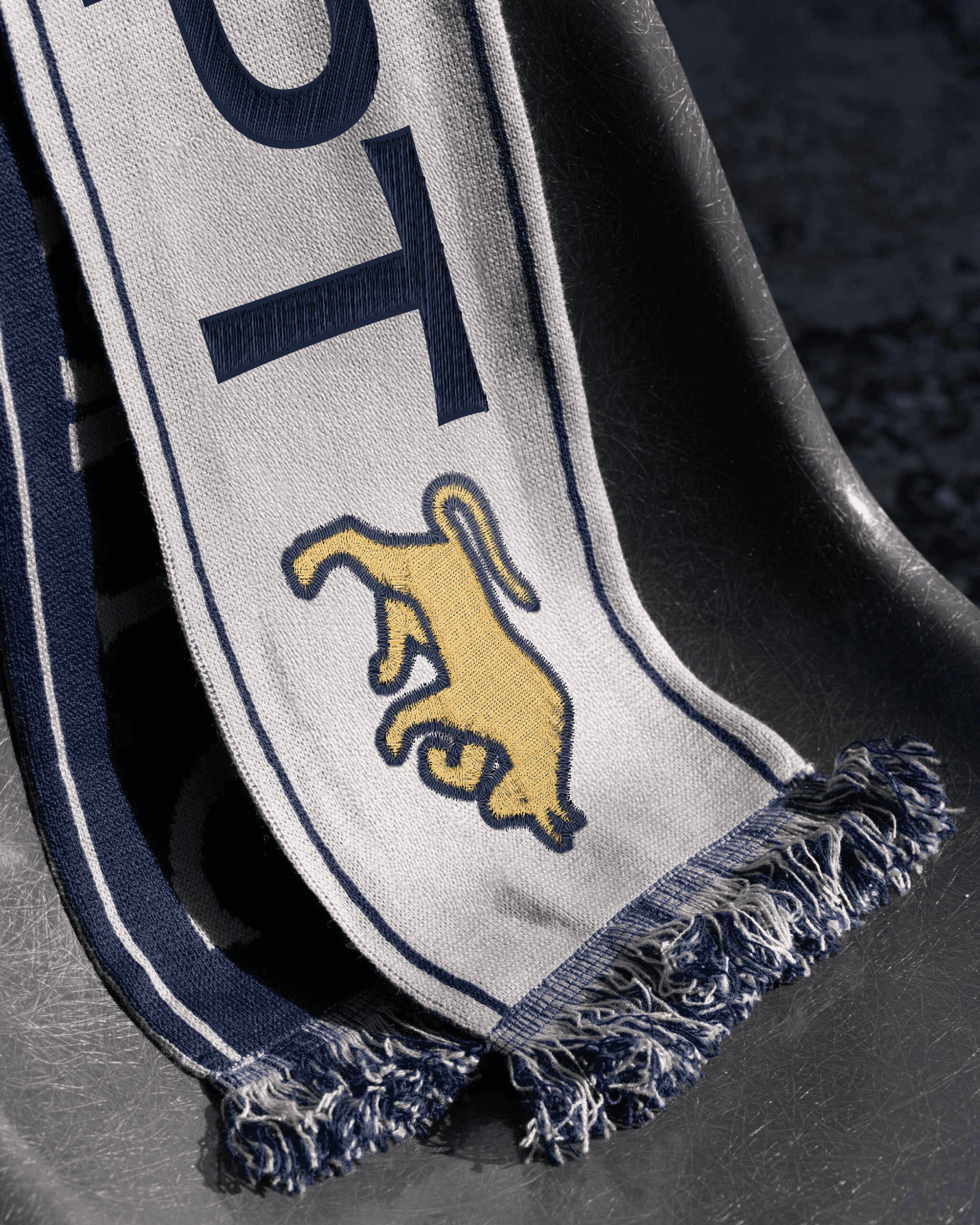 Modern home office setup with a monitor, ergonomic chair, keyboard, and indoor plants near a window with blinds.