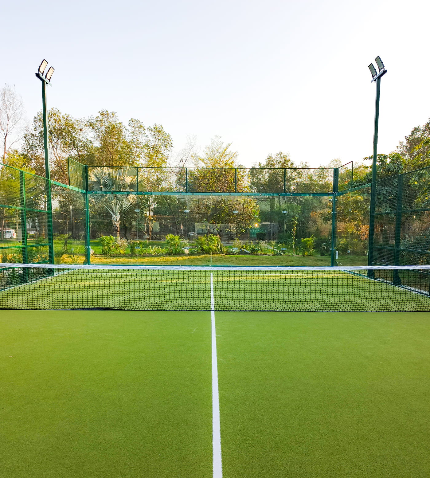 The wedding backdrop is the open sea, shimmering under late afternoon light