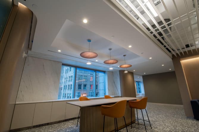 A conference room with hanging lamps
