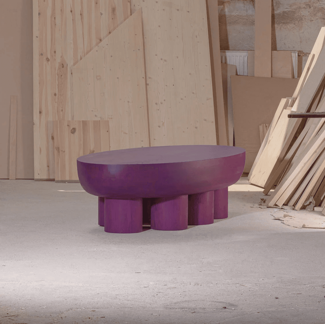 Cyclades Oval low table with circular geometric base and symmetrical layered structure by Jiri Krejcirik