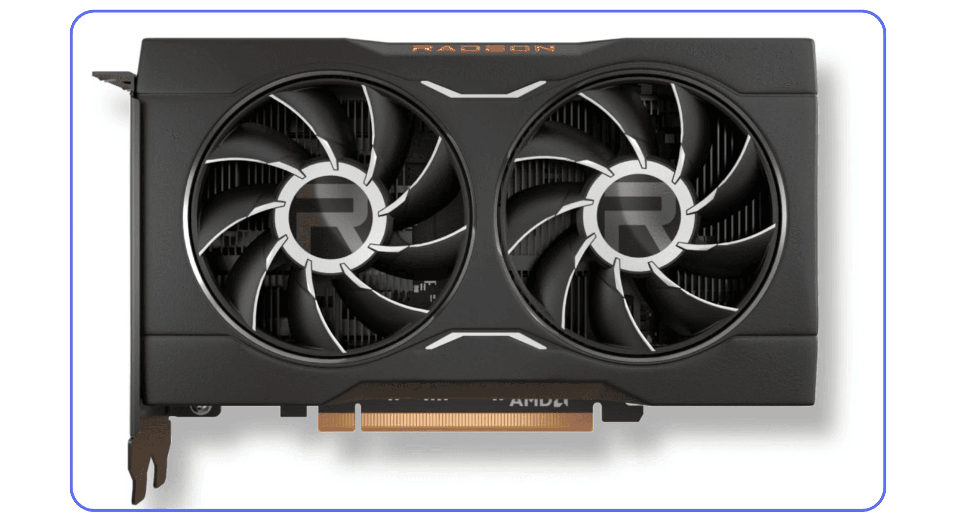 AMD Radeon RX 6500 XT GPU placed on editing desk beside laptop