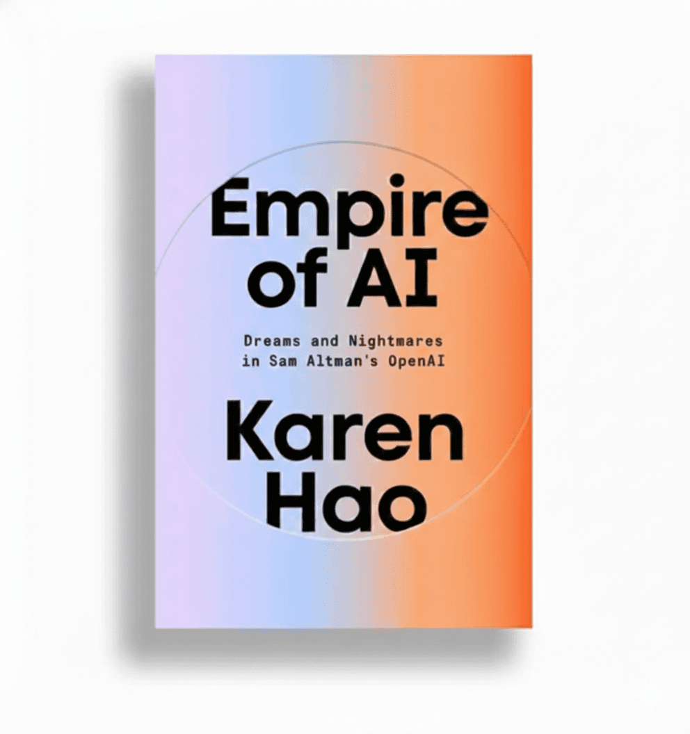 Minimal beige canvas tote bag with sturdy handles and a small leather tag on a light gray studio background.