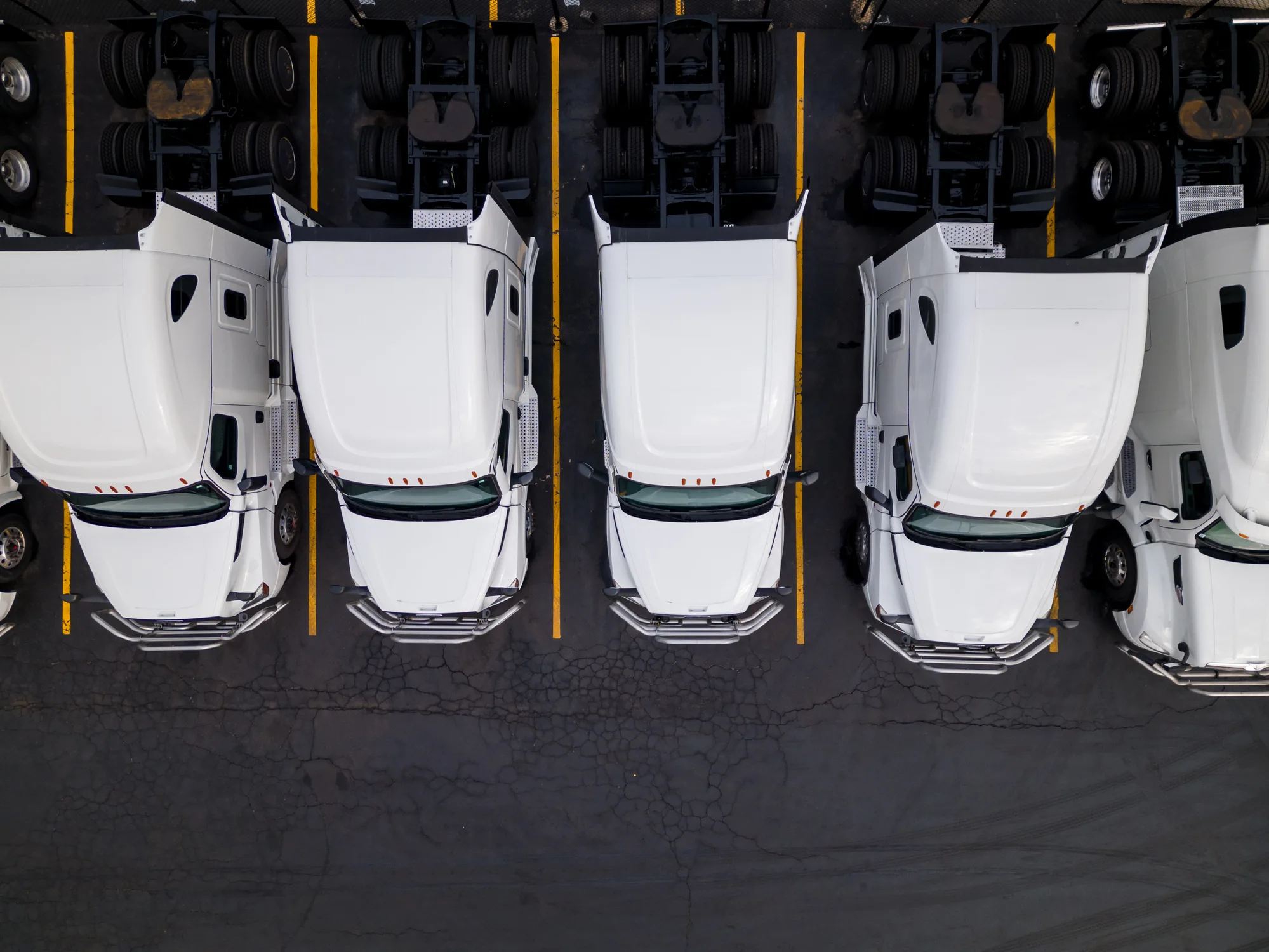 Parked semi-trucks symbolizing new authority commercial auto insurance