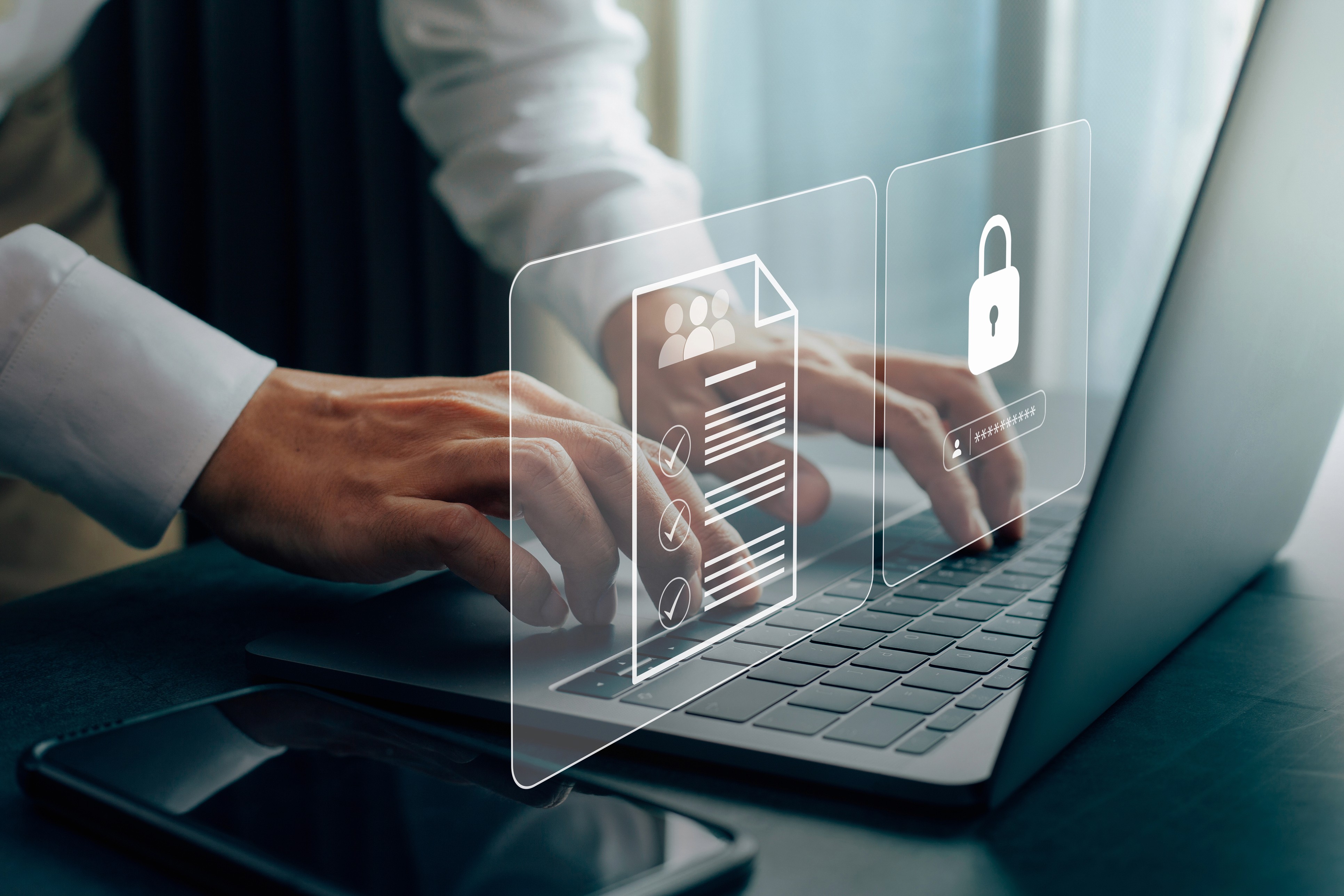 A business man protecting data on his computer