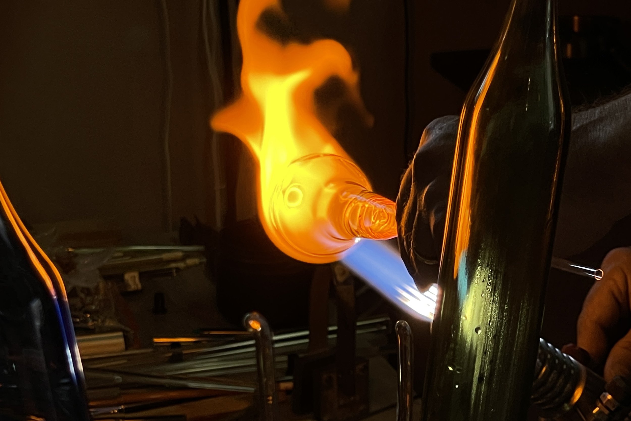 Image of glass blowing a glass award