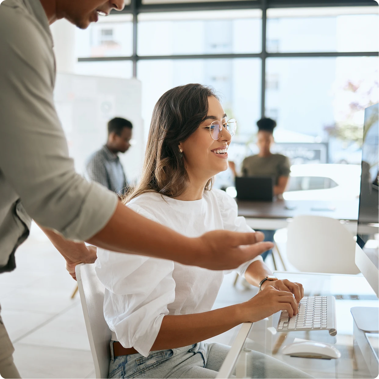 Centralized trading team reviewing account data and trade activity within an integrated wealth management platform supporting retirement account management.