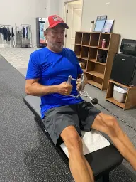 man in black hoodie standing