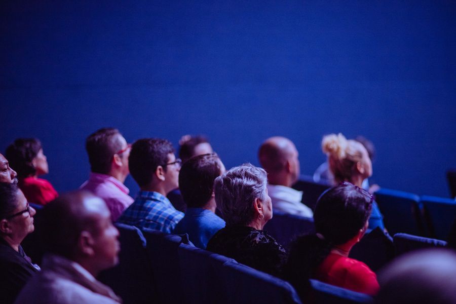 An engaged audience watching a presentation in a seminar room