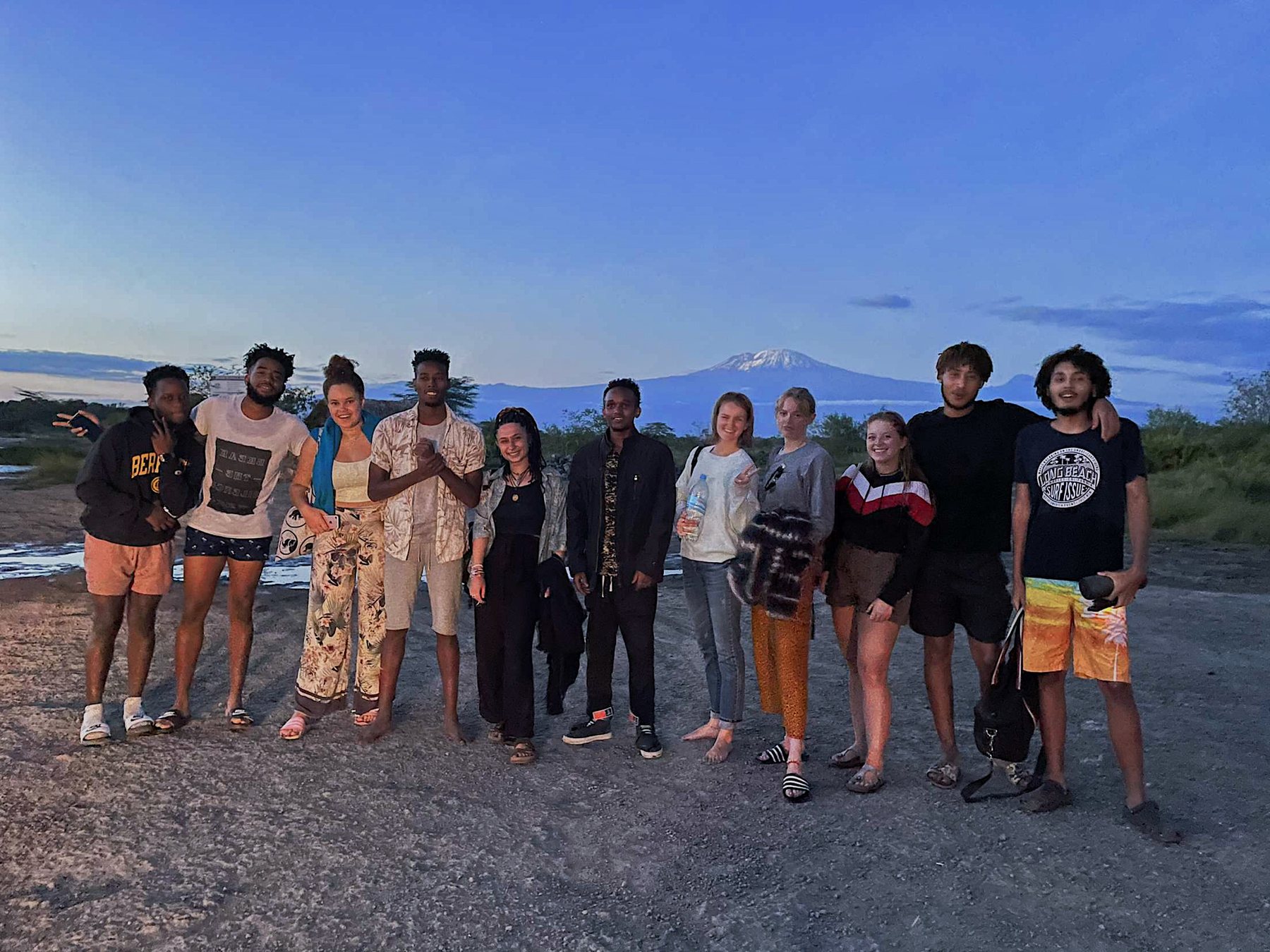 Travellers sharing a group journey in Tanzania.