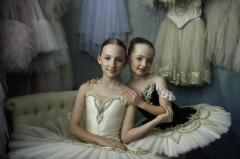 Ballerina siblings in beautiful tutus