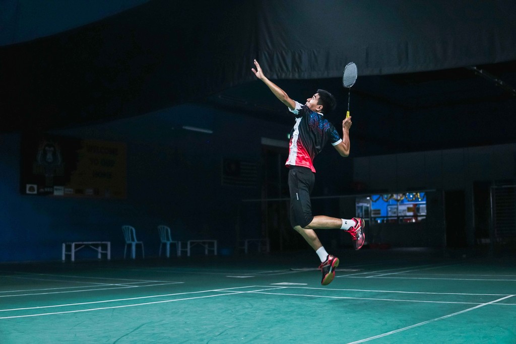 man playing badminton