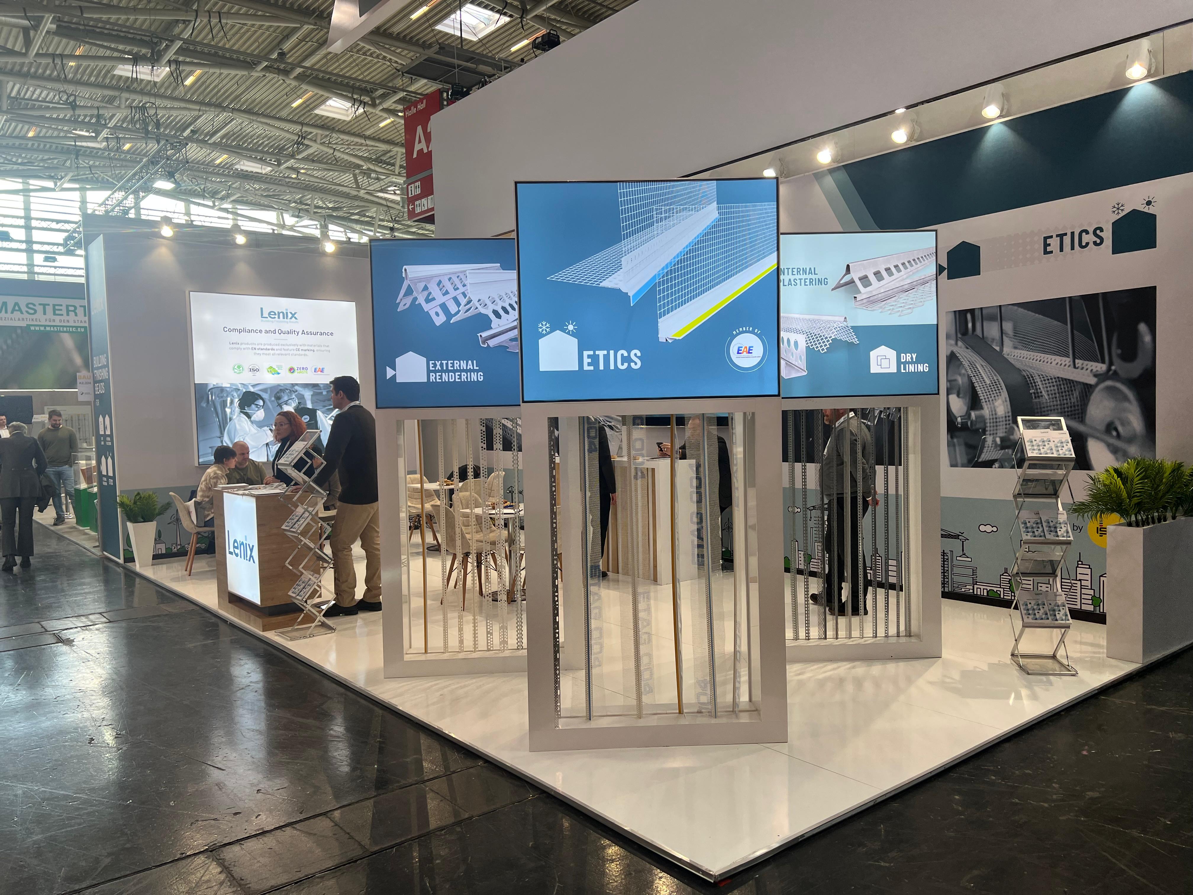 Branding and digital screen area at the Lenix stand, presenting the company's new identity under Işık Group.
