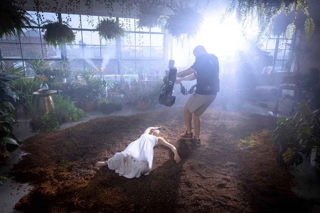 Behind the scenes wide view of the Bloom greenhouse studio setup