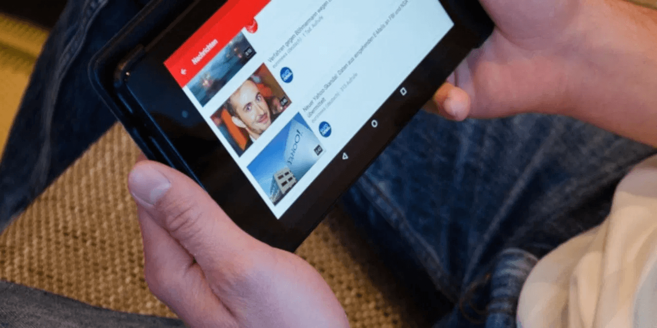 Man holding a tablet - Glasp YouTube Summarizer