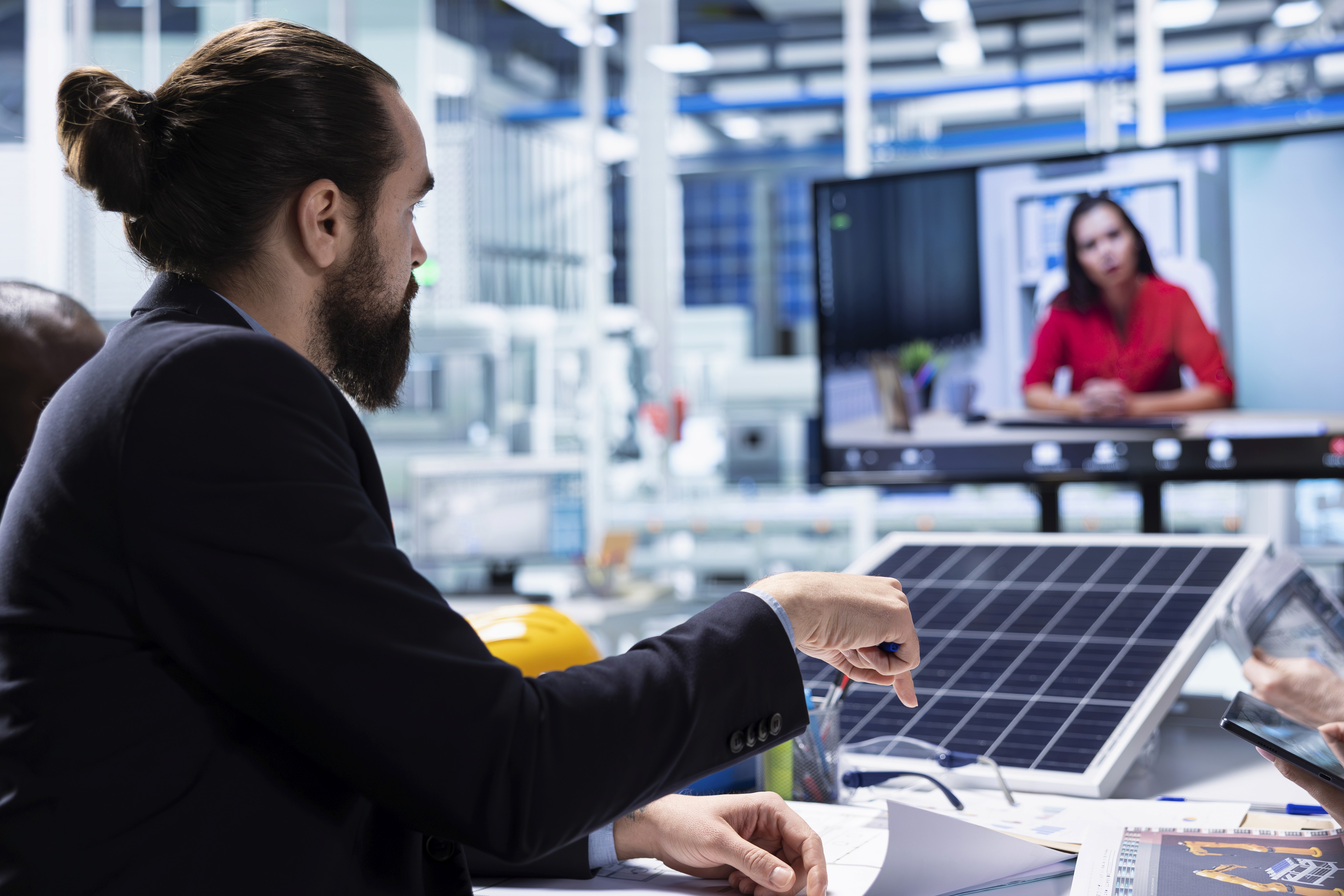 Corporate office building with a massive rooftop solar array generating clean energy for business.