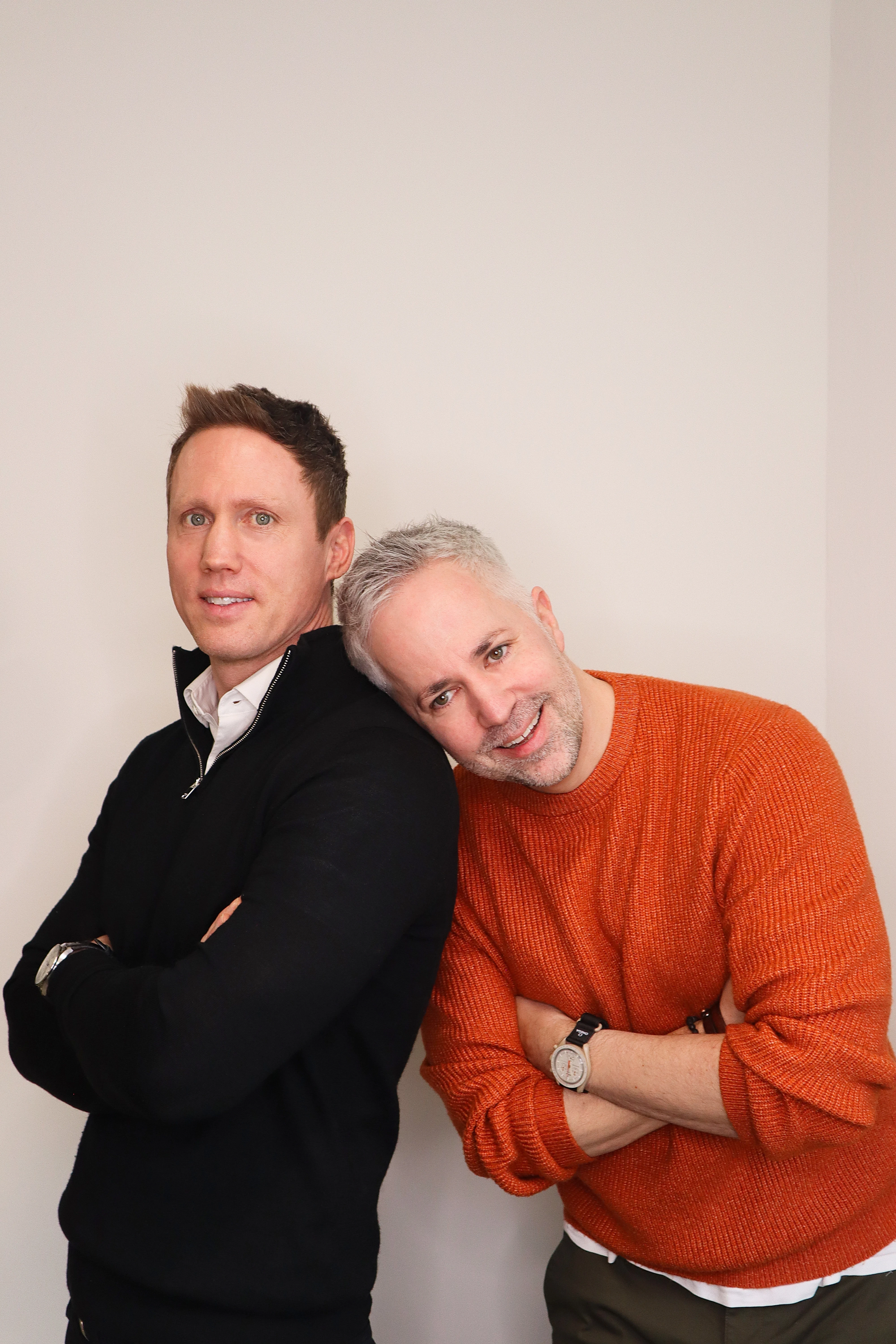 Spen and Rich from Launch smiling together in the office workspace