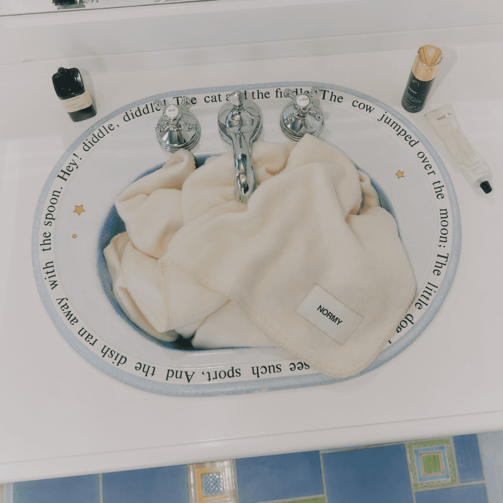 wool blanket placed in sink