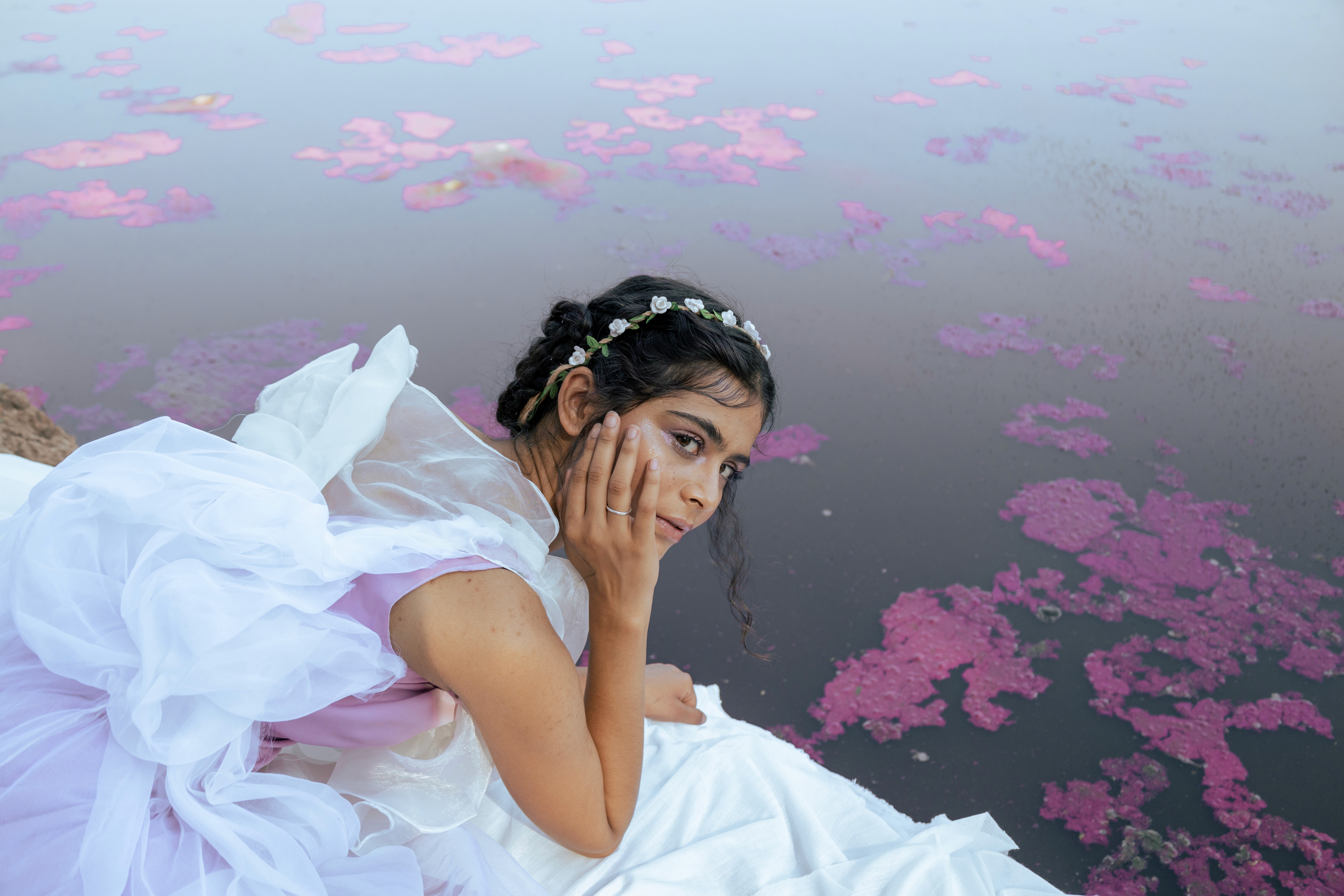 Laptop displaying website on wooden table