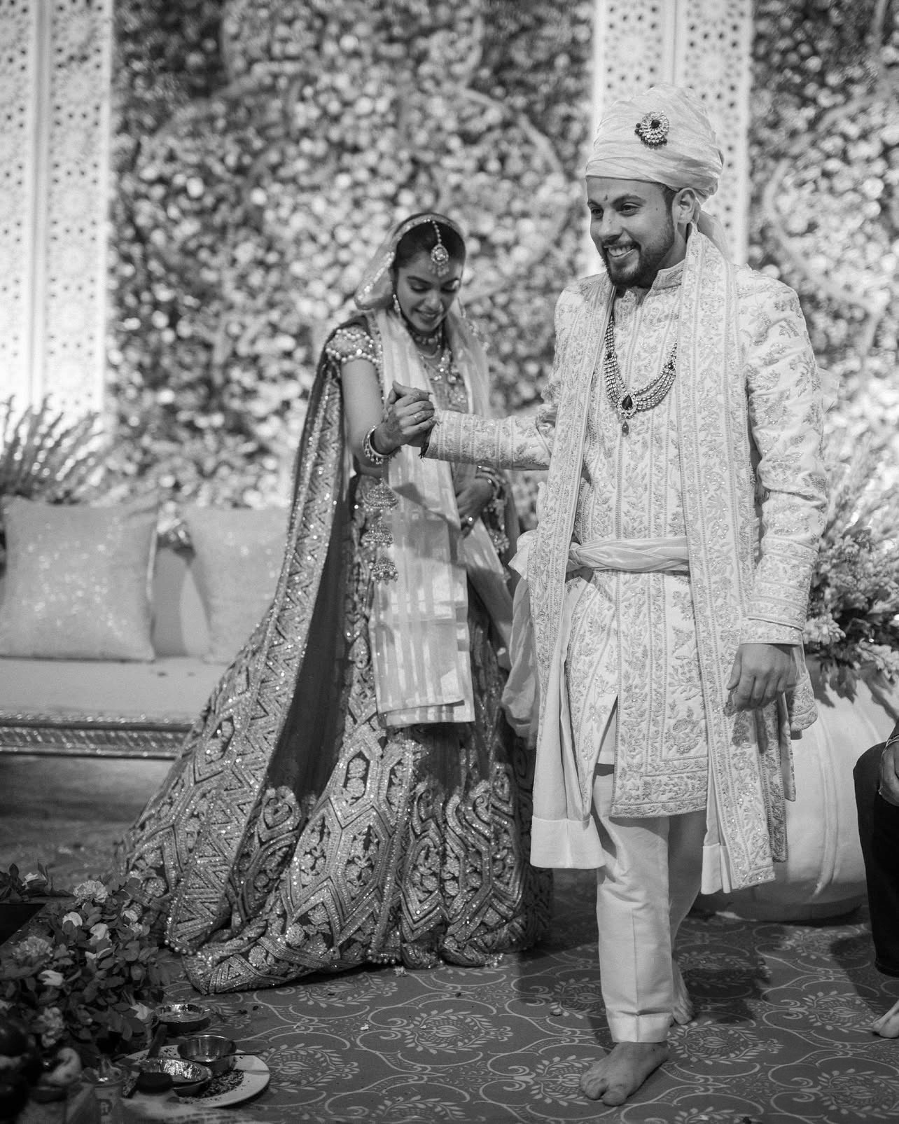 woman in white wedding dress holding bouquet of flowers