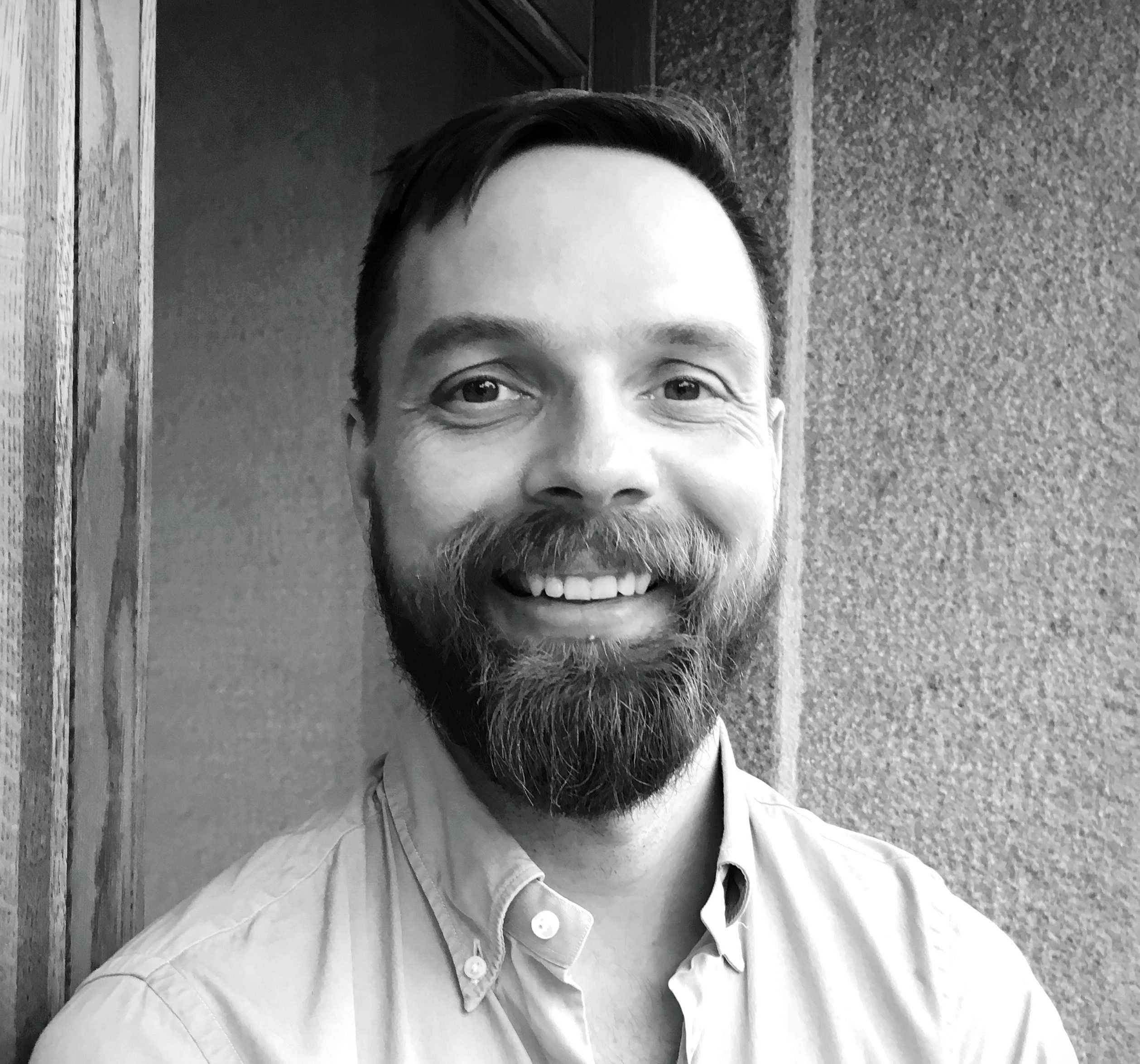 A bearded smiling Norwegian