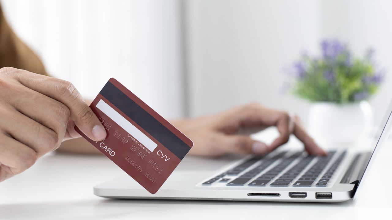 user entering credit card information