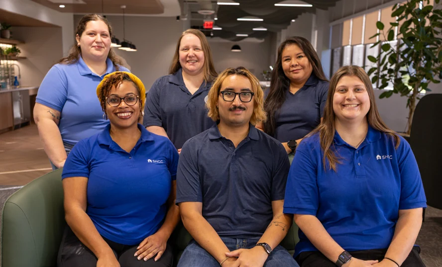 Southwest Housing Compliance Corporation team members pictured in the report