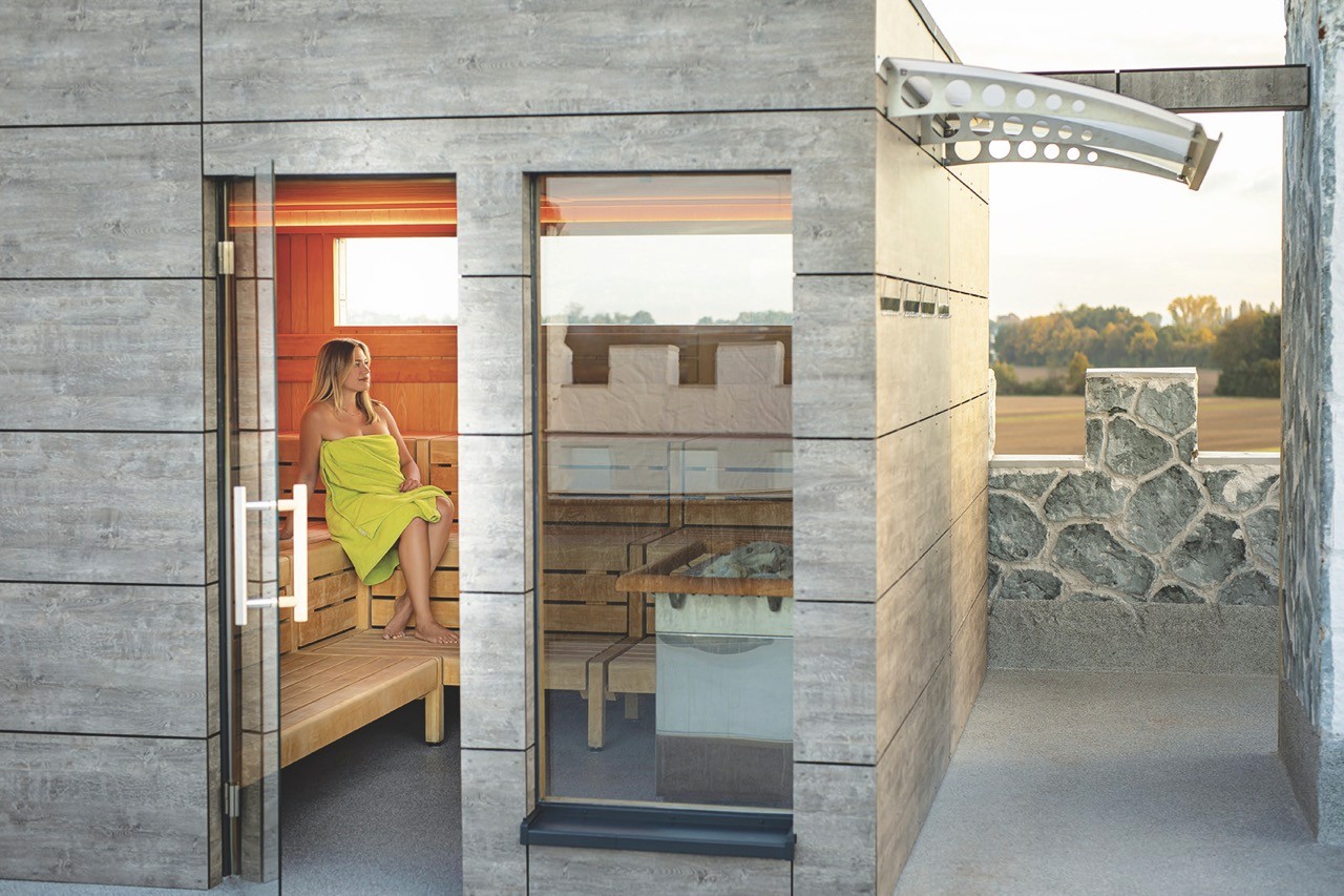 A group of women doing exercises with dumbbells