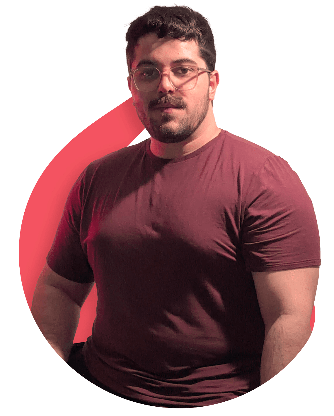 Cleon Morais standing, in a burgundy T-shirt and round glasses.
