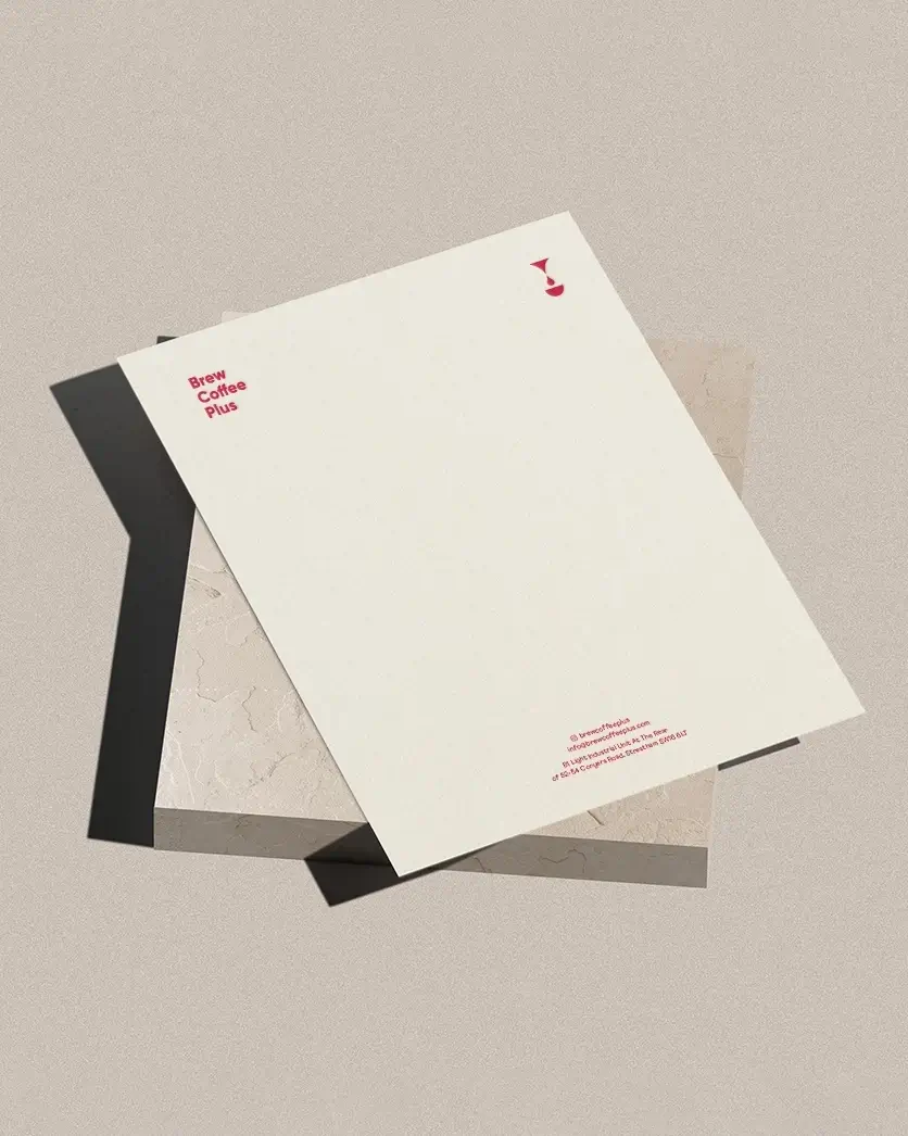 Brew Coffee Plus letterhead and stationery with red logo details on neutral paper