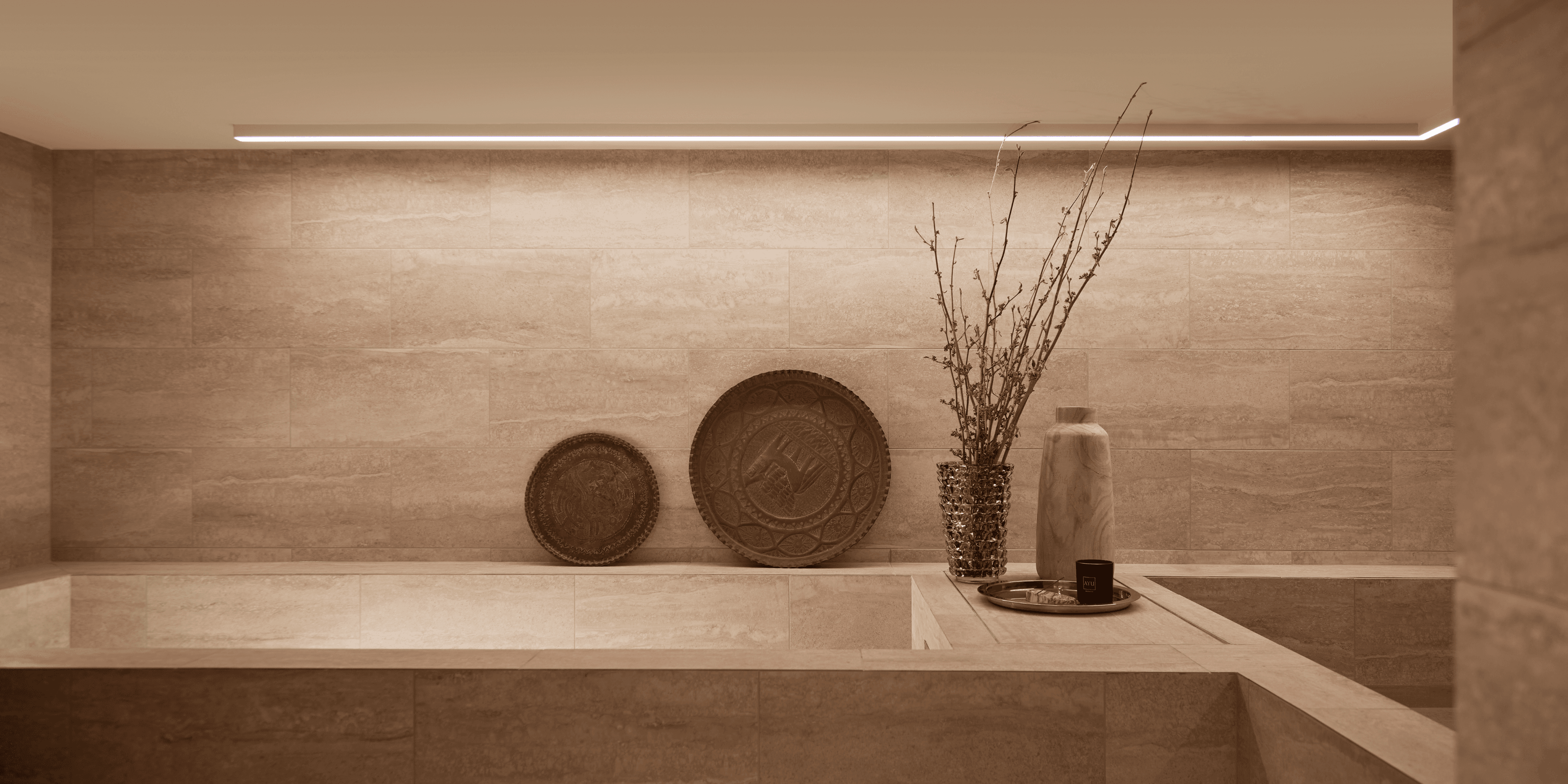 A woman practicing yoga in a spacious studio, positioned on a mat.