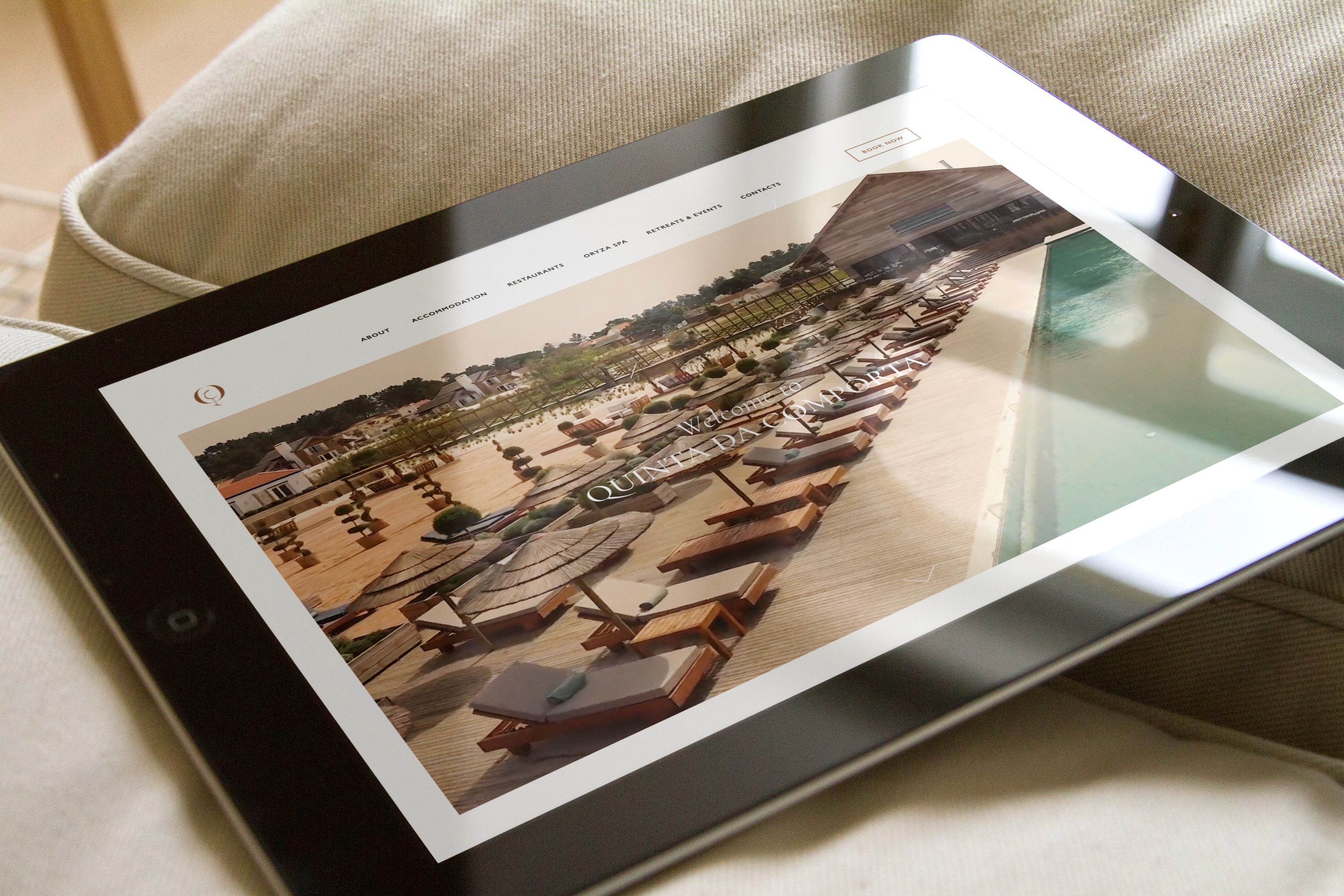 an image of a luxury resort website on an iPad