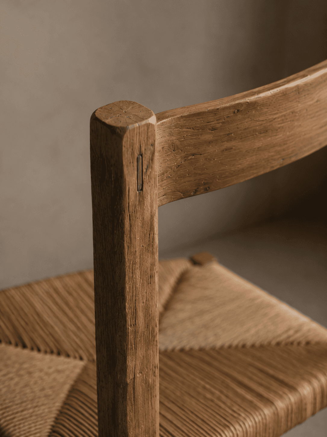 Rustic wooden chair details in sunlight