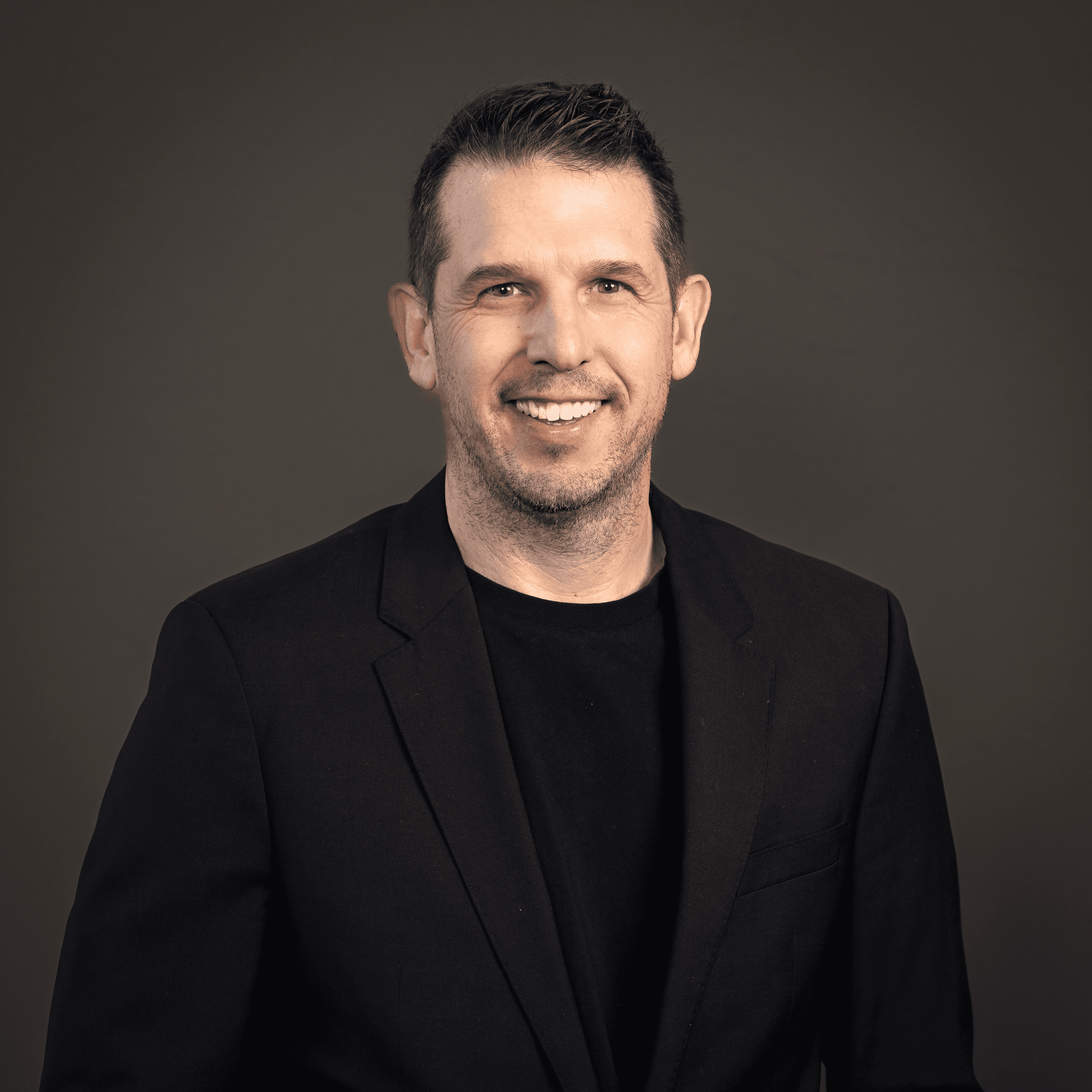 person sitting in a chair in front of a man