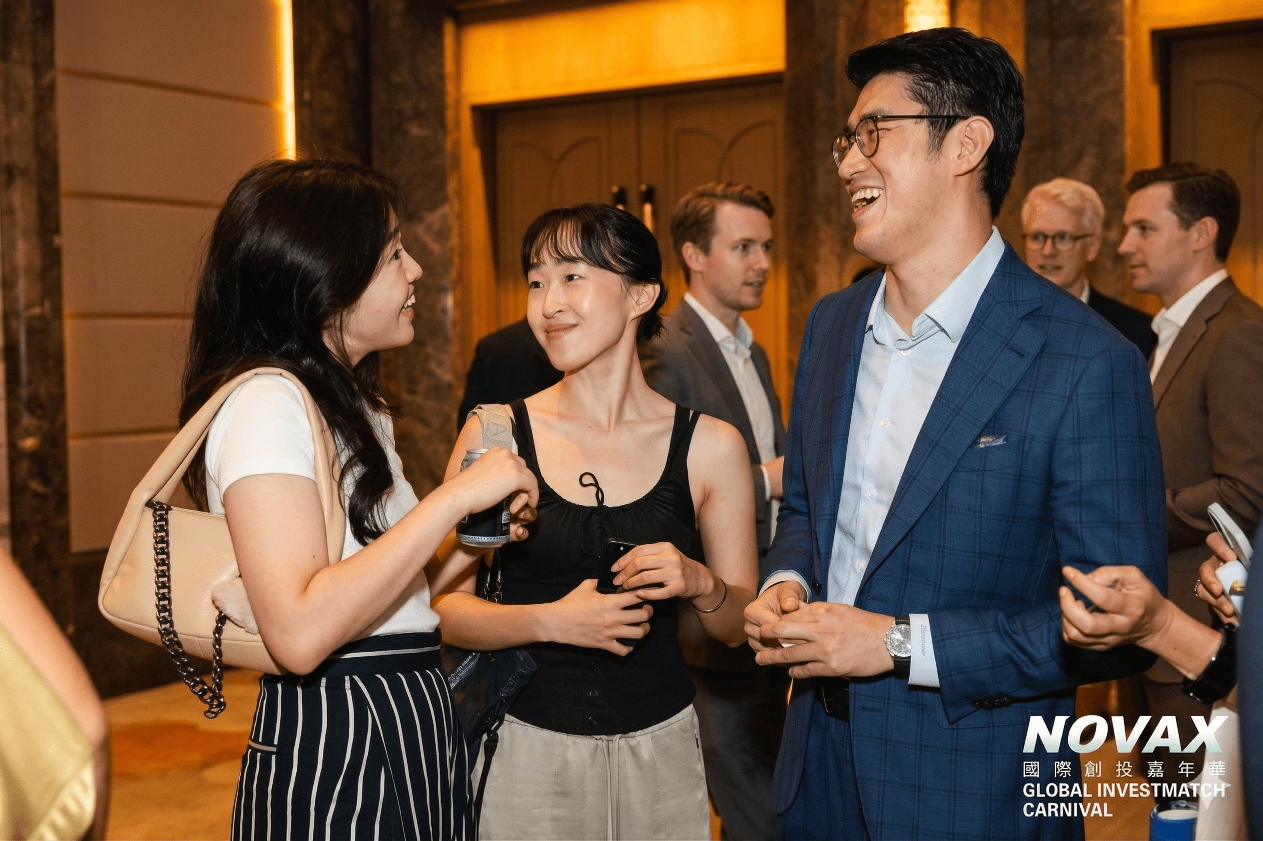 group of people taking photo near brown wooden tree