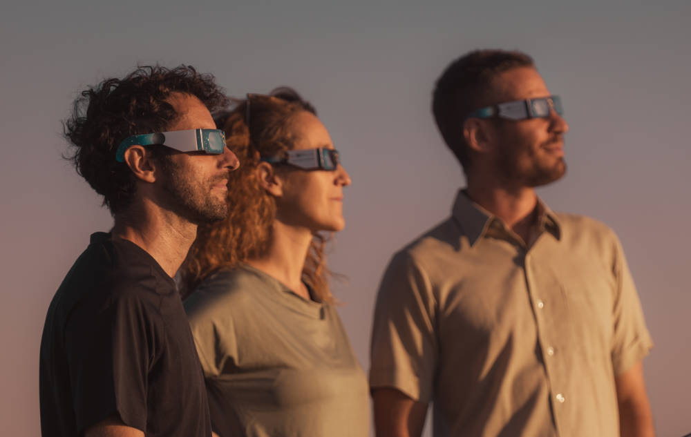Observe the partial phase of a solar eclipse with certified eclipse glasses