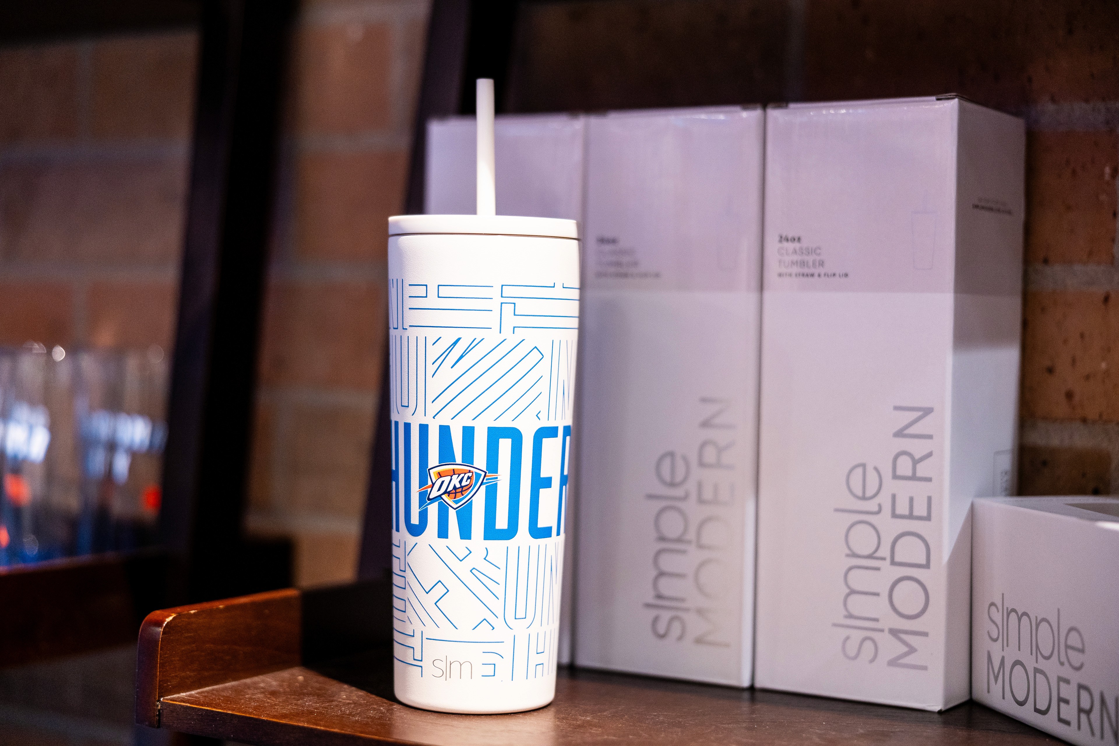 a woman holding an apple