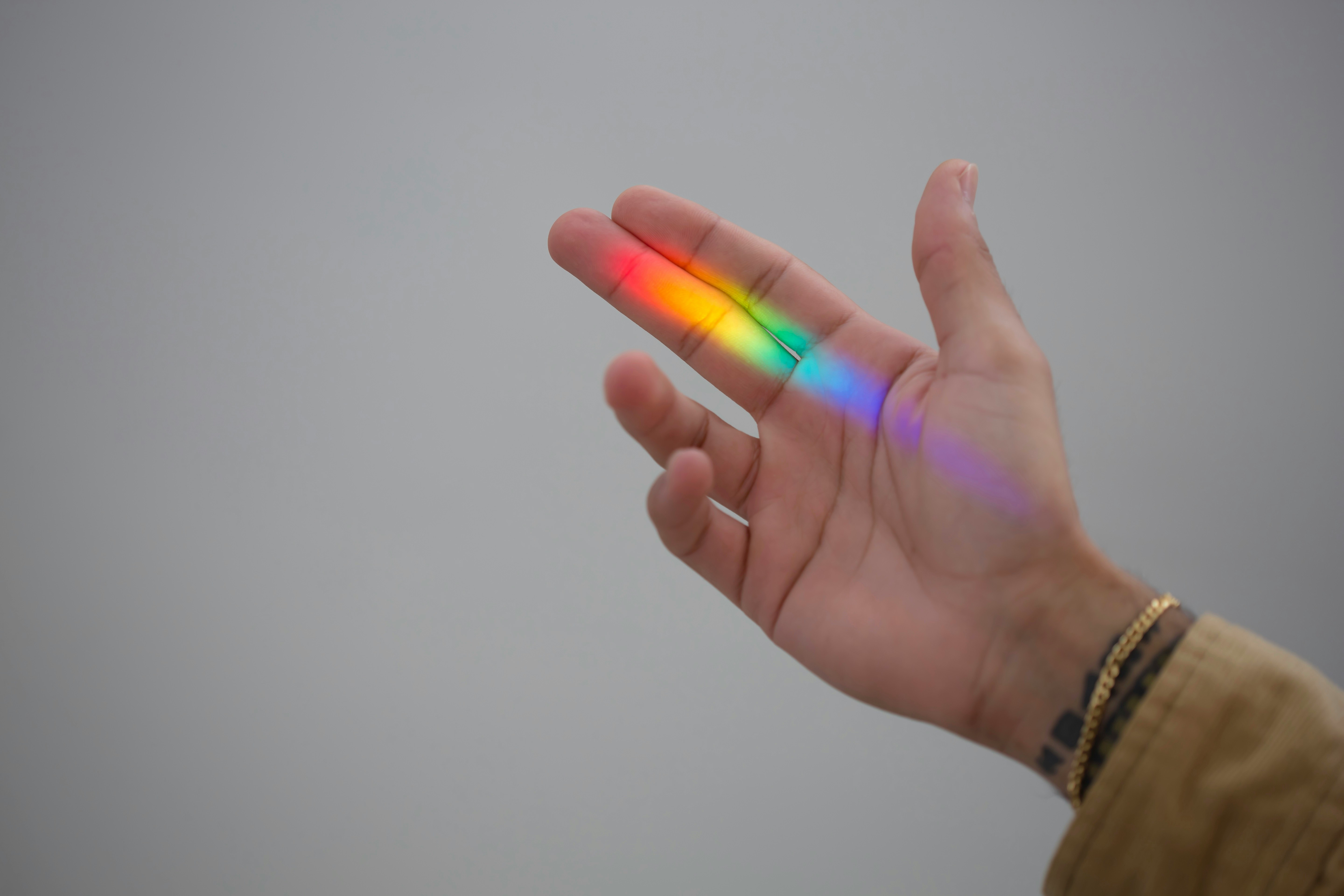 Rainbow Colors on Person Hand - AI Color Analysis