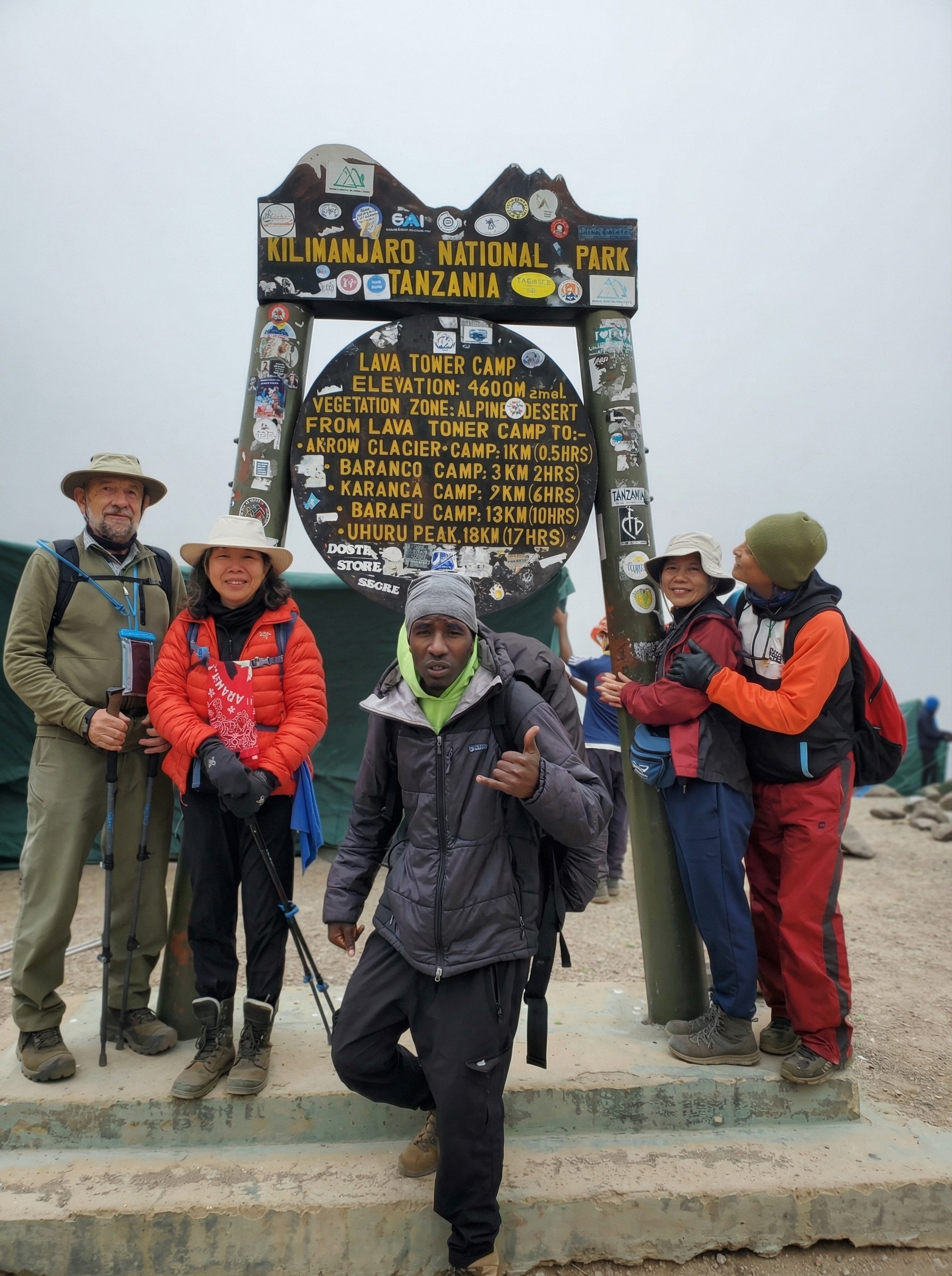 Desert footsteps leading through soft dunes under pale morning light in AlUla.