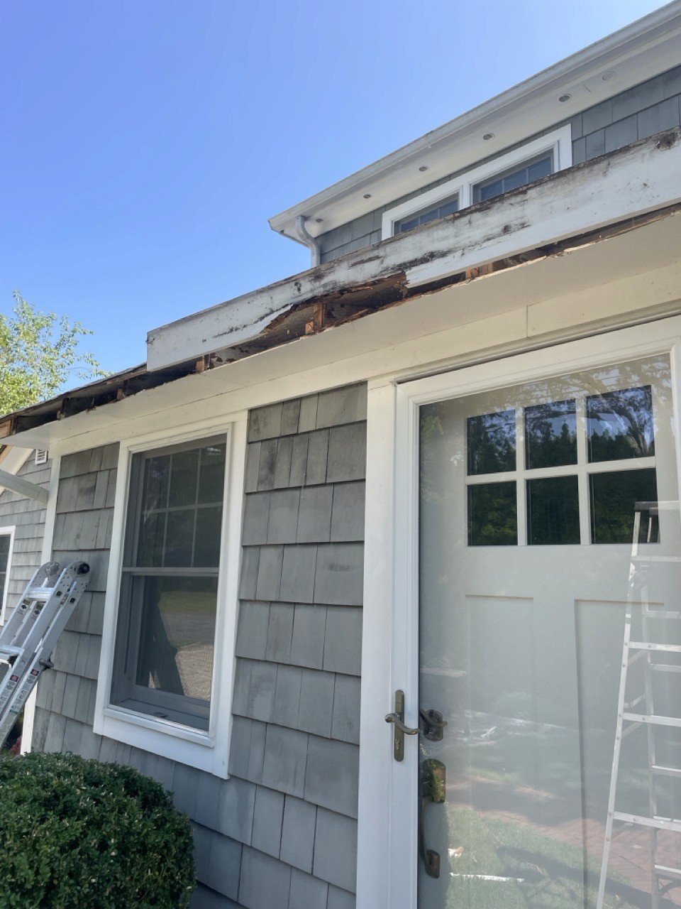 Damaged exterior trim before repair