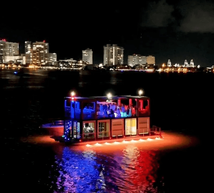 XOXO Classic charter at night