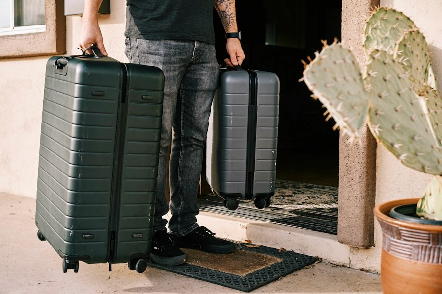 Professional arriving with luggage for a corporate relocation.